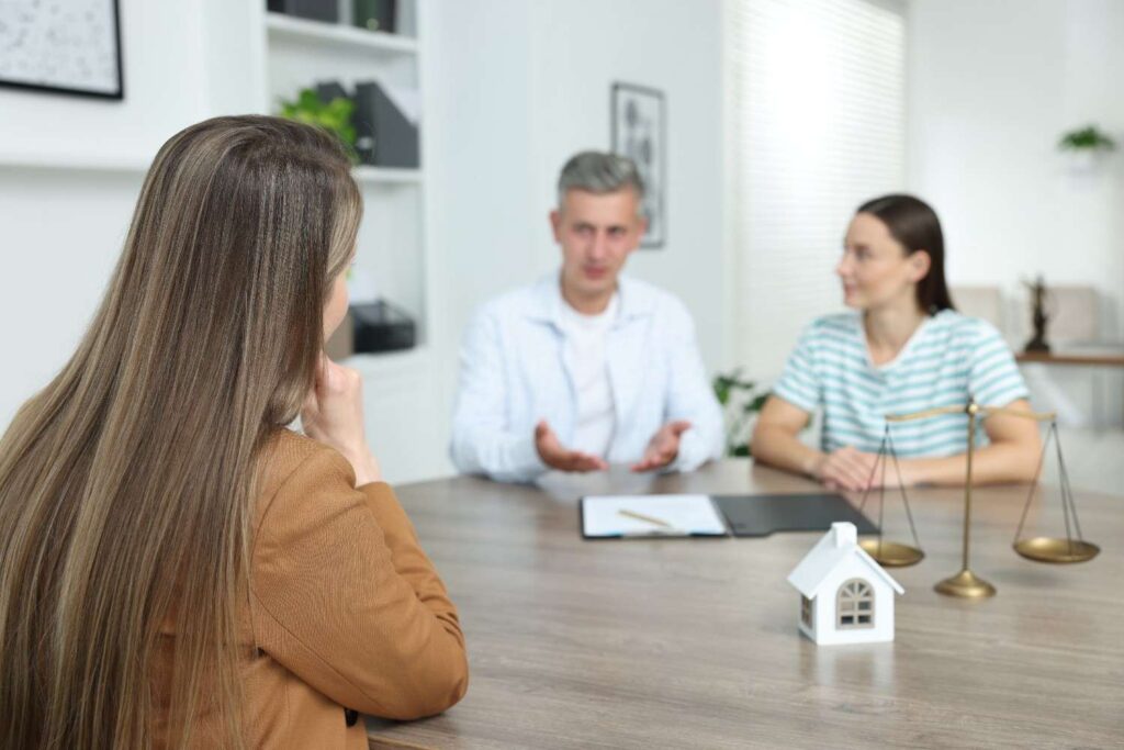 Couple talking with a family lawyer about what counts as income for child support